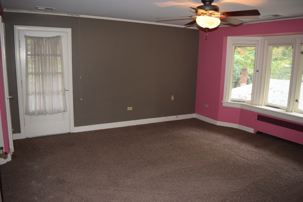 341 Scottswood Road Riverside, IL 60546 - Photo 29 of 46 an empty room with windows