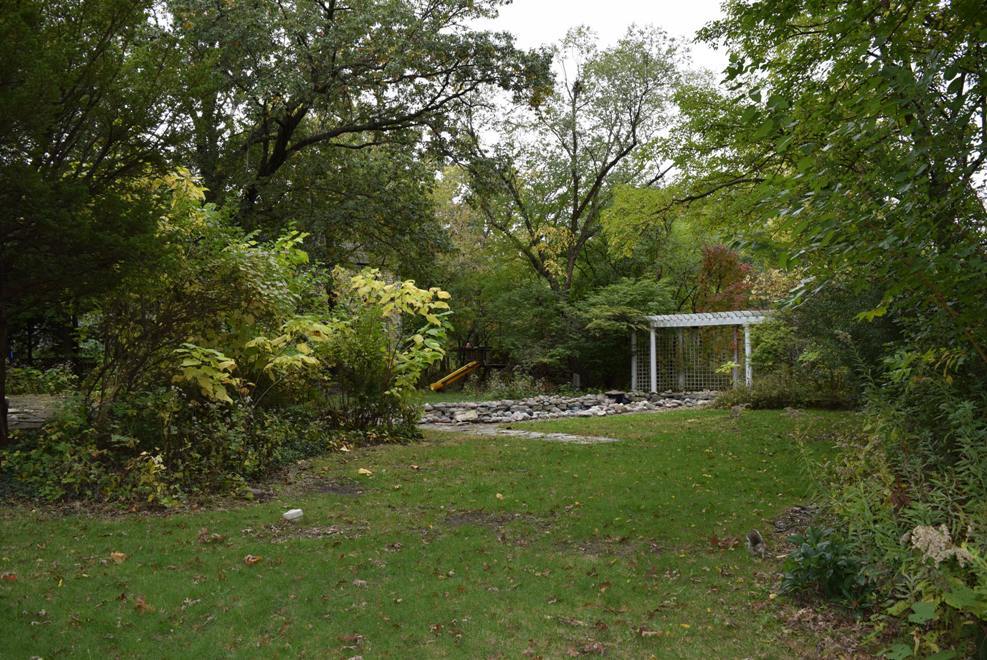 341 Scottswood Road Riverside, IL 60546 - Photo 45 of 46 a view of a house with a yard and sitting area