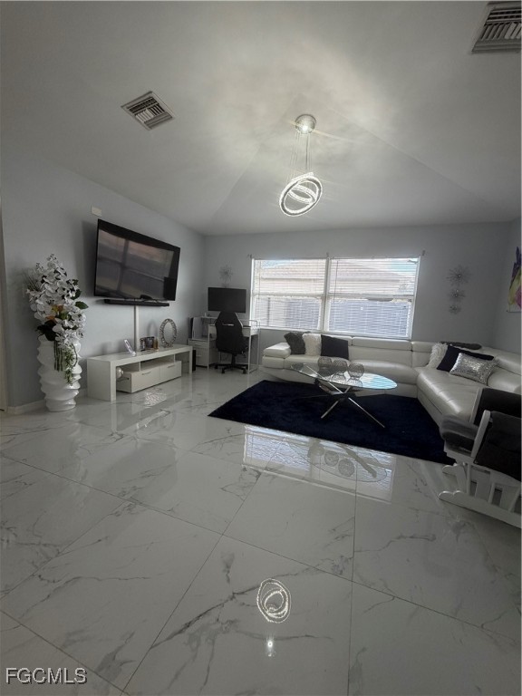 4427 25th Street Southwest Lehigh Acres, FL 33973 - Photo 9 of 20 a kitchen with a sink and cabinets
