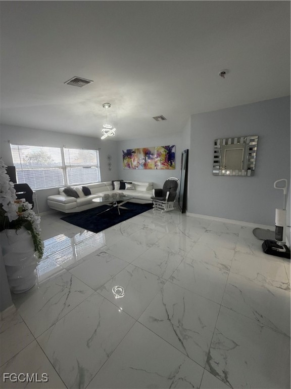 4427 25th Street Southwest Lehigh Acres, FL 33973 - Photo 10 of 20 a kitchen with a sink and a stove top oven