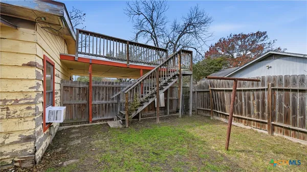 a view of staircase with a small cabin