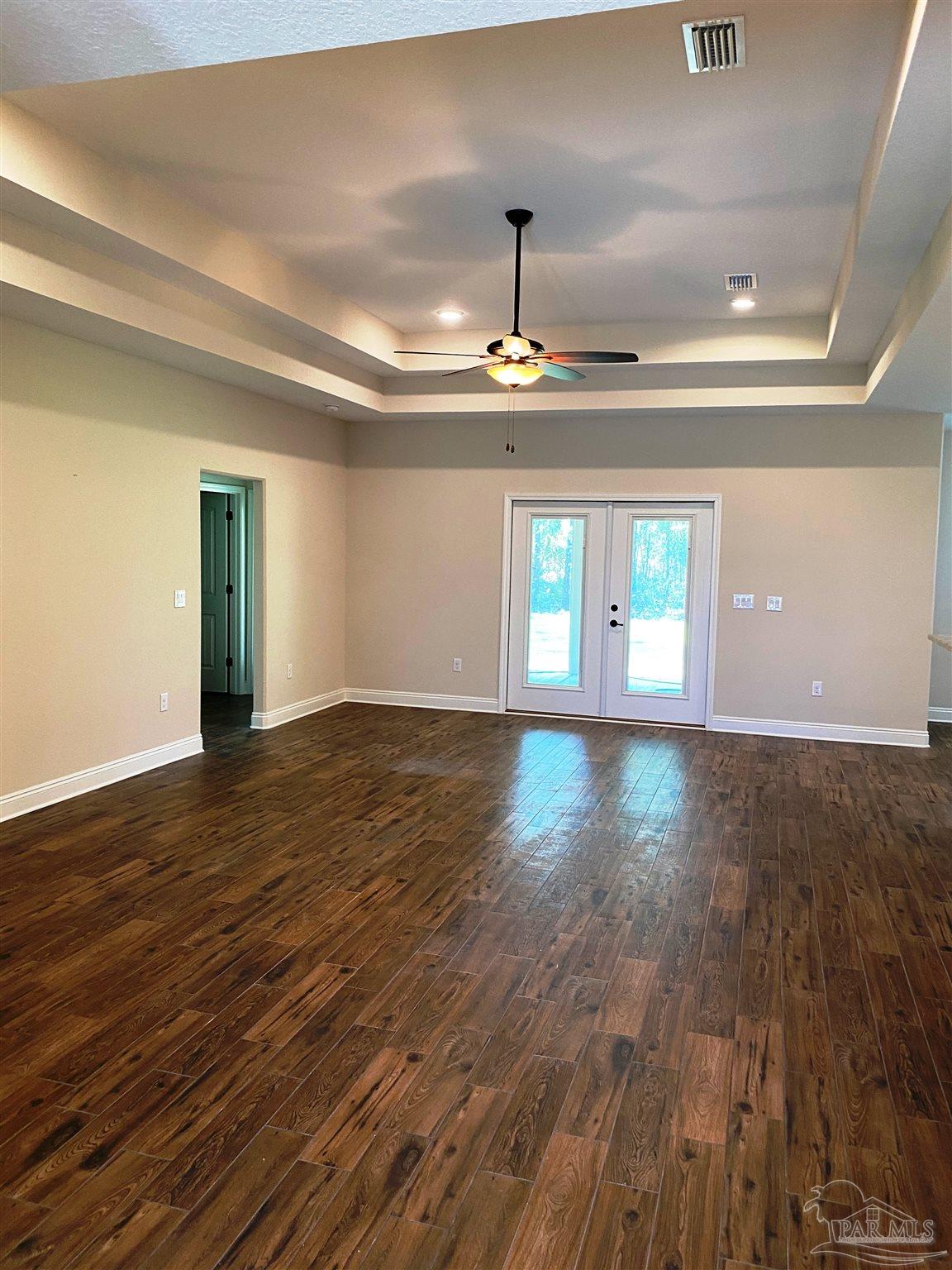 5472 South A Jones Road Milton, FL 32583 - Photo 2 of 29 A view from foyer to living room is shown here.