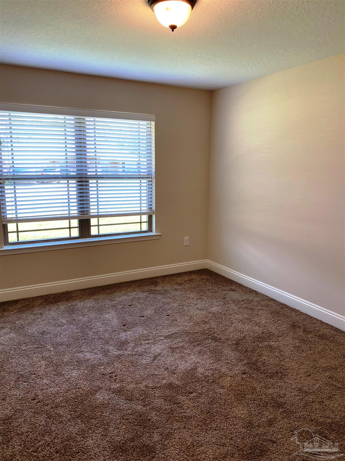 5472 South A Jones Road Milton, FL 32583 - Photo 22 of 29 Here's a view of the 2nd bedroom.