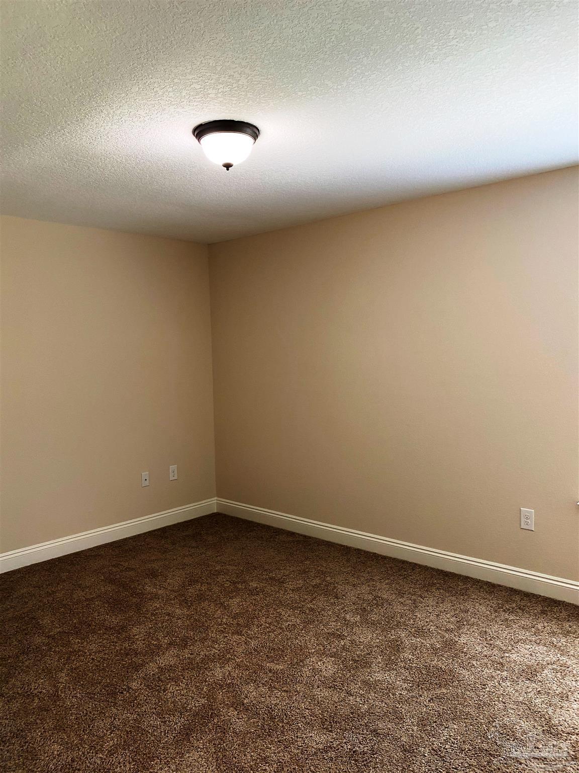 5472 South A Jones Road Milton, FL 32583 - Photo 24 of 29 A view of the 3rd bedroom is shown here.