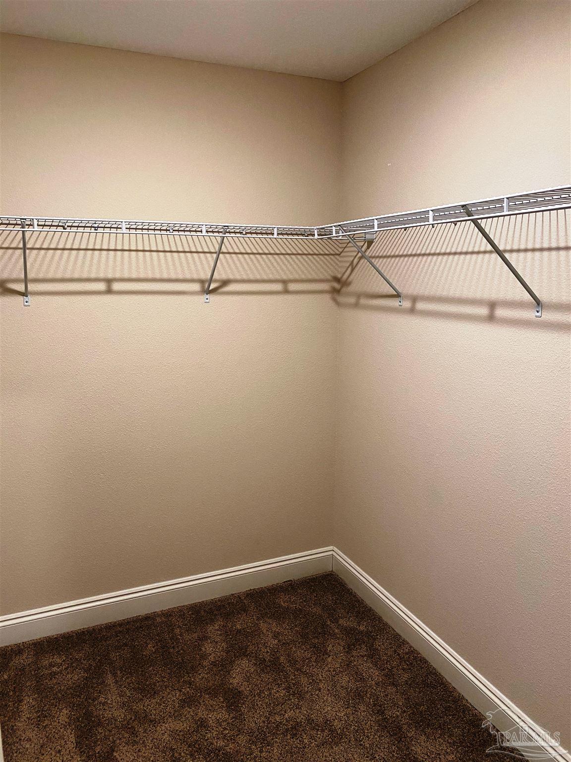 5472 South A Jones Road Milton, FL 32583 - Photo 5 of 29 Here's a view of the master walk-n closet #1.