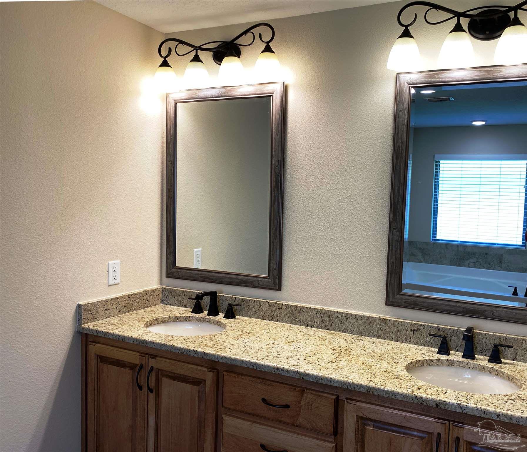 5472 South A Jones Road Milton, FL 32583 - Photo 7 of 29 Master bath features a dual sink vanity.