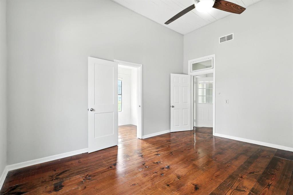 400 Katy Street Alba, TX 75410 - Photo 22 of 40 an empty room with wooden floor
