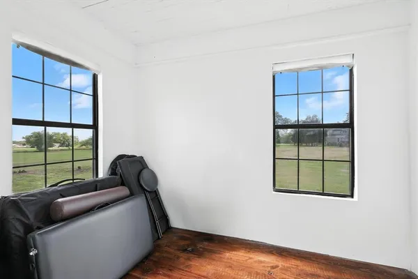 a room with furniture and a window