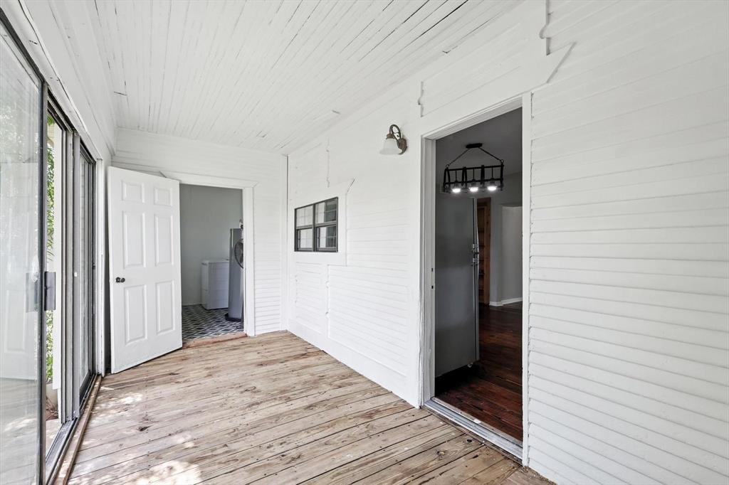 400 Katy Street Alba, TX 75410 - Photo 33 of 40 a view of a hallway with wooden floor and closet