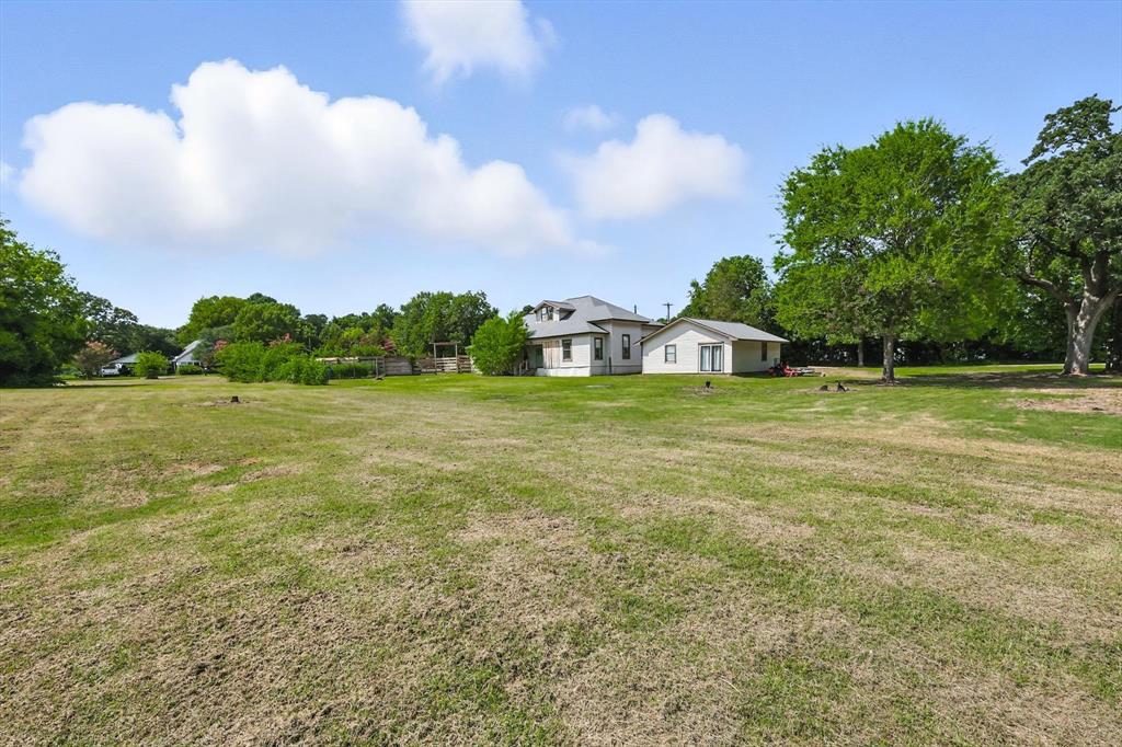 400 Katy Street Alba, TX 75410 - Photo 36 of 40 a view of a field with an trees in the background