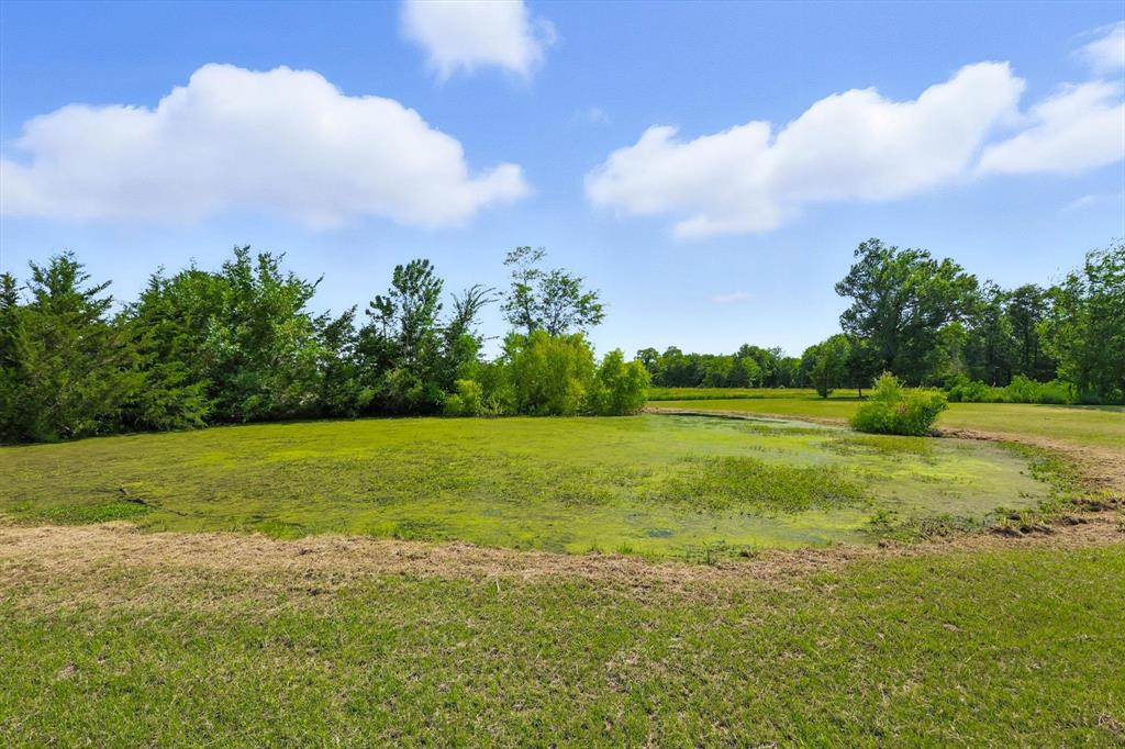 400 Katy Street Alba, TX 75410 - Photo 37 of 40 a view of a golf course with a lake
