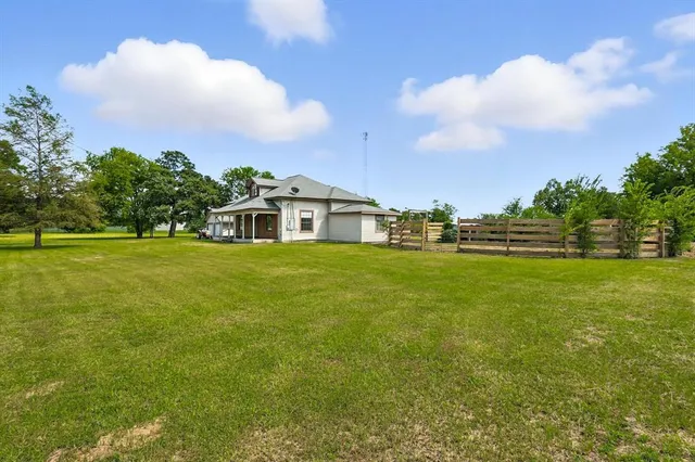 a view of house with outdoor space