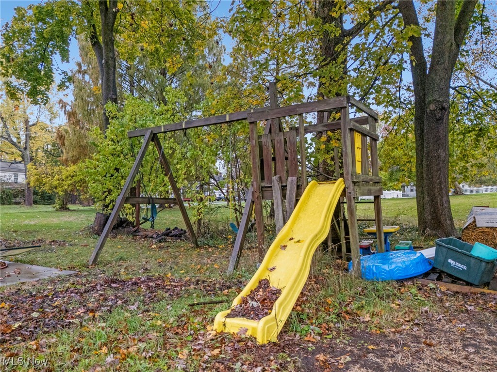 6453 Waterloo Road Atwater, OH 44201 - Photo 23 of 24 View of playground featuring a lawn