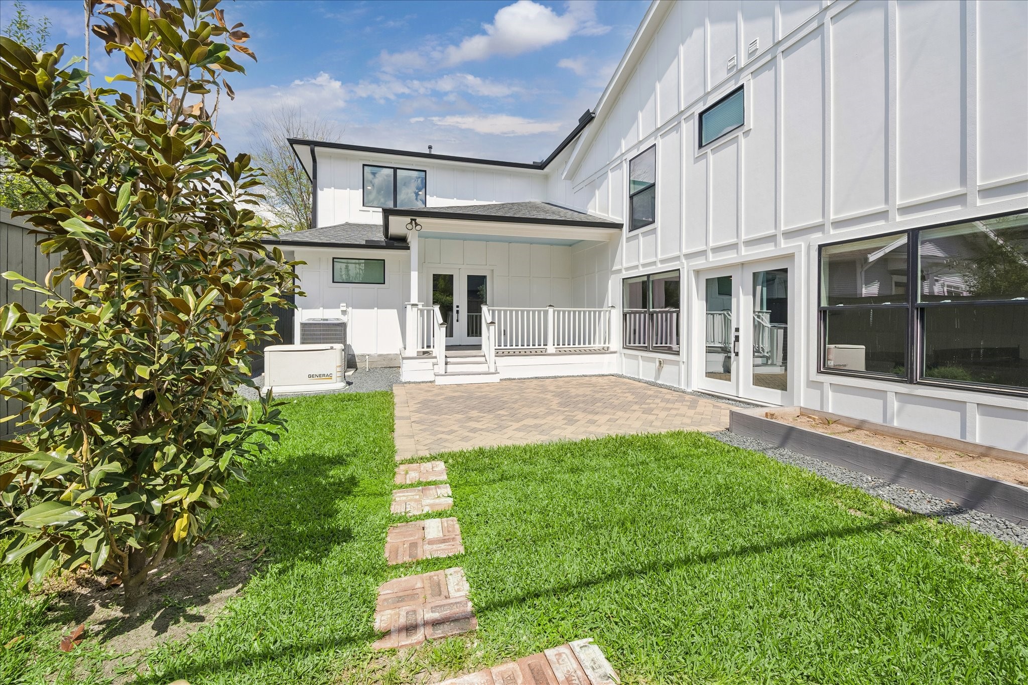 1112 Merrill Street Houston, TX 77009 - Photo 9 of 42 Your private back yard awaits with access directly off of the kitchen and the game room.