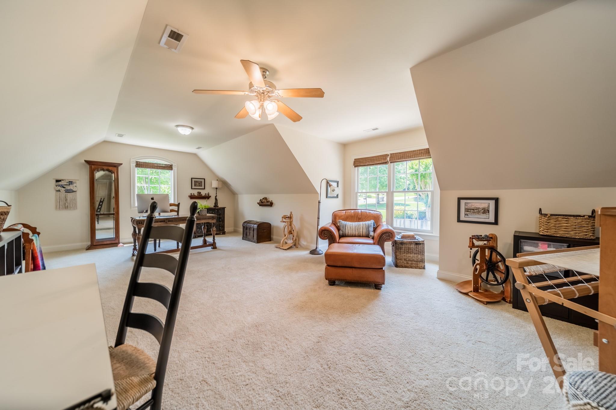 4273 Sailview Drive Denver, NC 28037 - Photo 22 of 39 a view of a livingroom with furniture and a ceiling fan