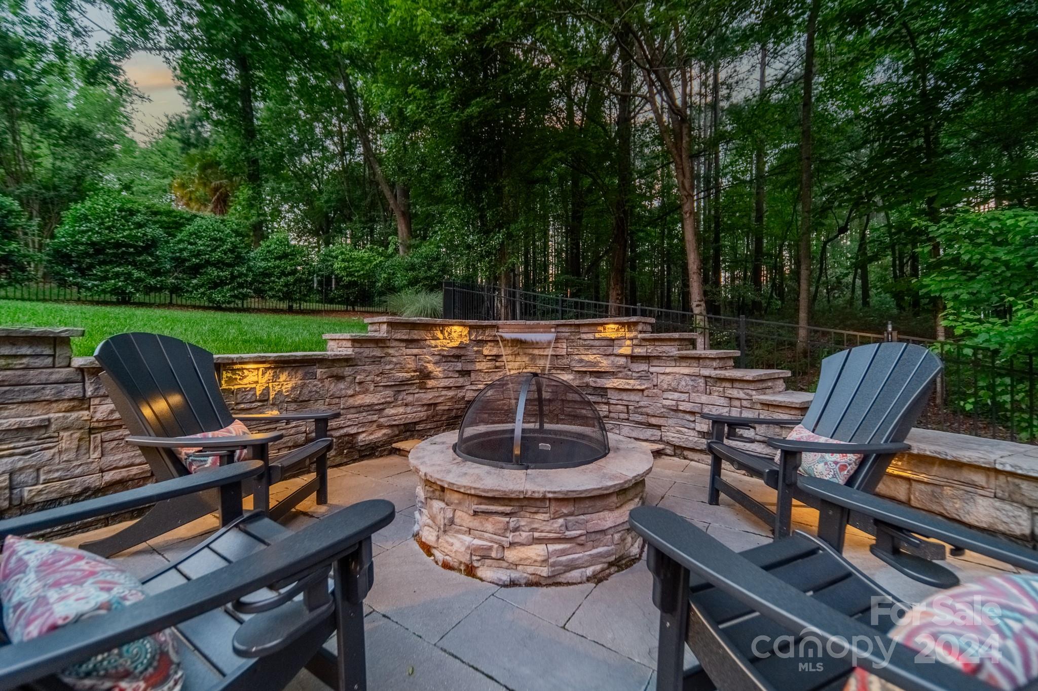 4273 Sailview Drive Denver, NC 28037 - Photo 3 of 39 a backyard of a house with barbeque oven table and chairs