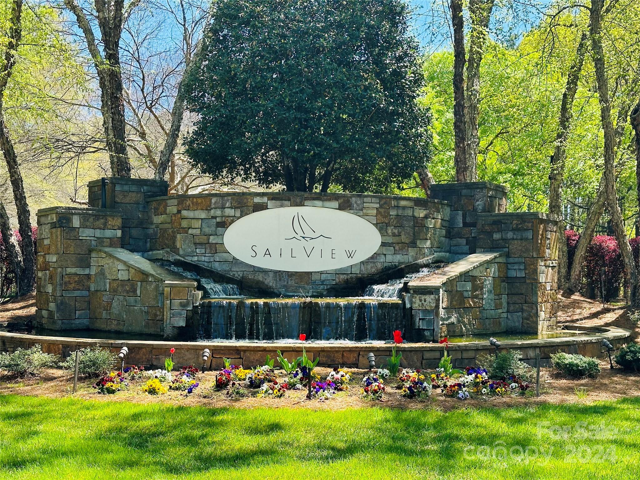 4273 Sailview Drive Denver, NC 28037 - Photo 34 of 39 a front view of a house with garden