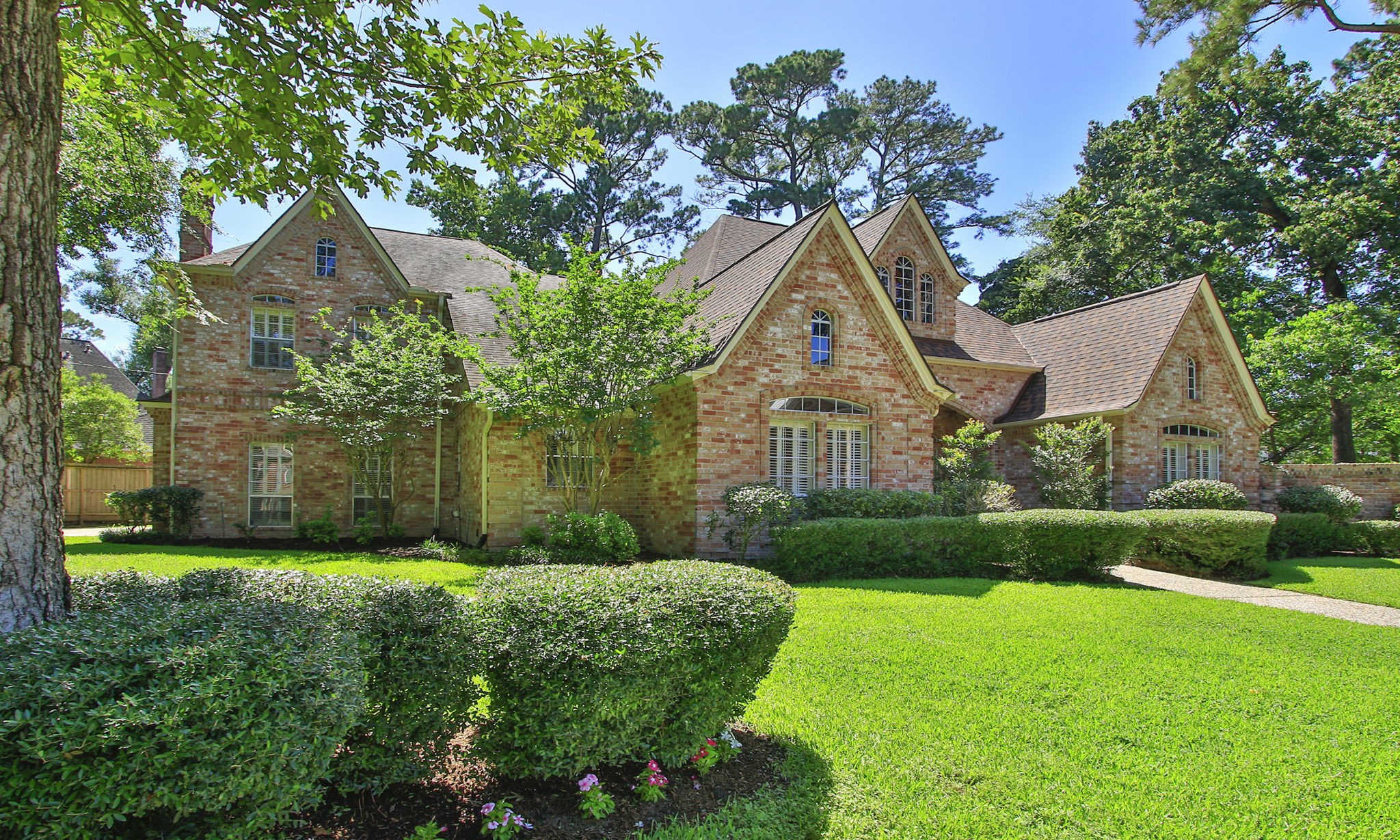 15923 Harwick Drive Spring, TX 77379 - Photo 3 of 50 Situated on almost a half acre lot, this home has gorgeous trees.