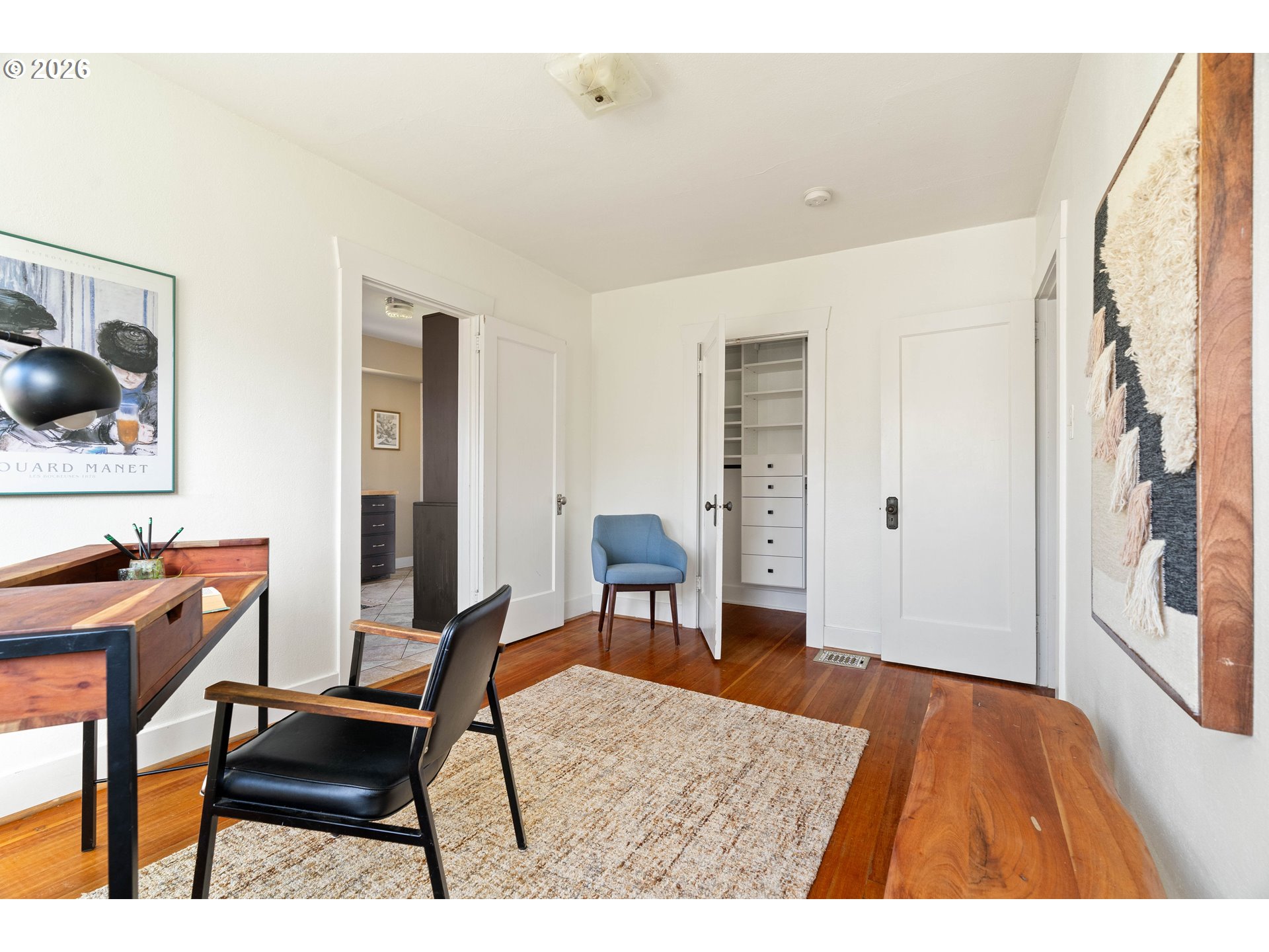 3215 Northeast 63rd Avenue Portland, OR 97213 - Photo 17 of 47 a workspace room with furniture and wooden floor