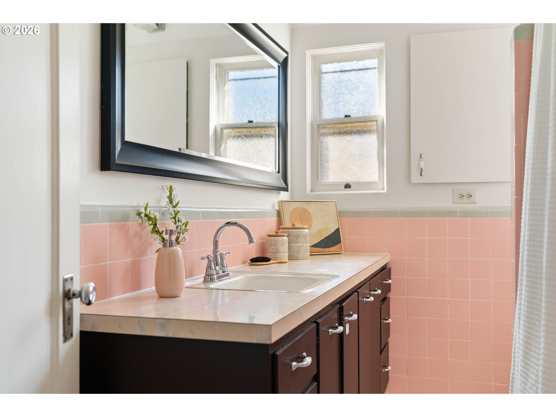 3215 Northeast 63rd Avenue Portland, OR 97213 - Photo 20 of 47 a bathroom with a sink and a mirror