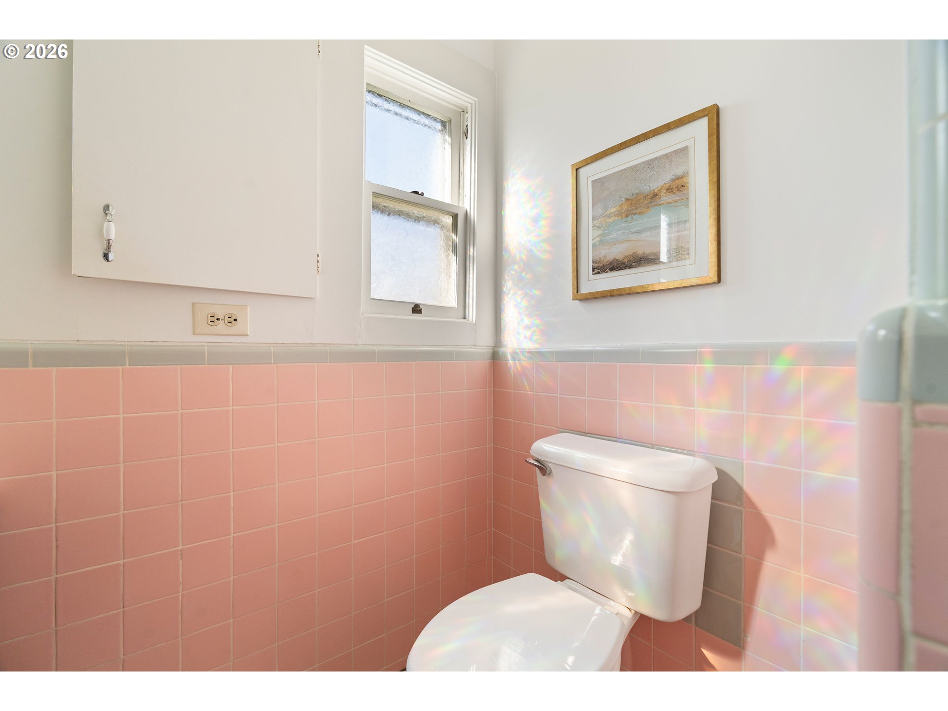 3215 Northeast 63rd Avenue Portland, OR 97213 - Photo 21 of 47 a white toilet sitting next to a bathroom sink