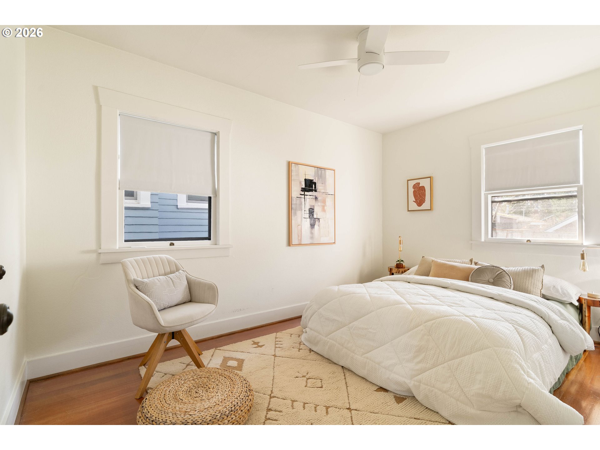 3215 Northeast 63rd Avenue Portland, OR 97213 - Photo 23 of 47 a bedroom with a bed and a window