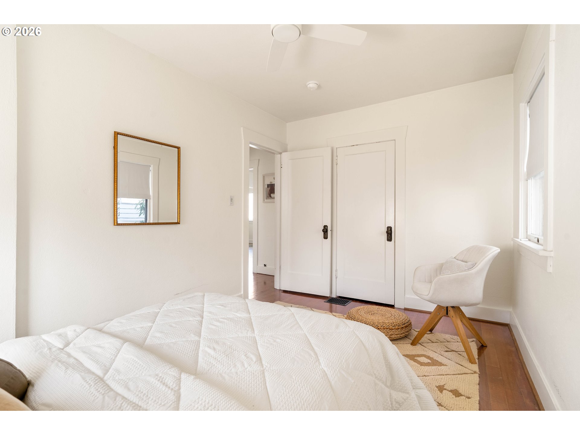 3215 Northeast 63rd Avenue Portland, OR 97213 - Photo 24 of 47 a bedroom with a bed and a painting on the wall