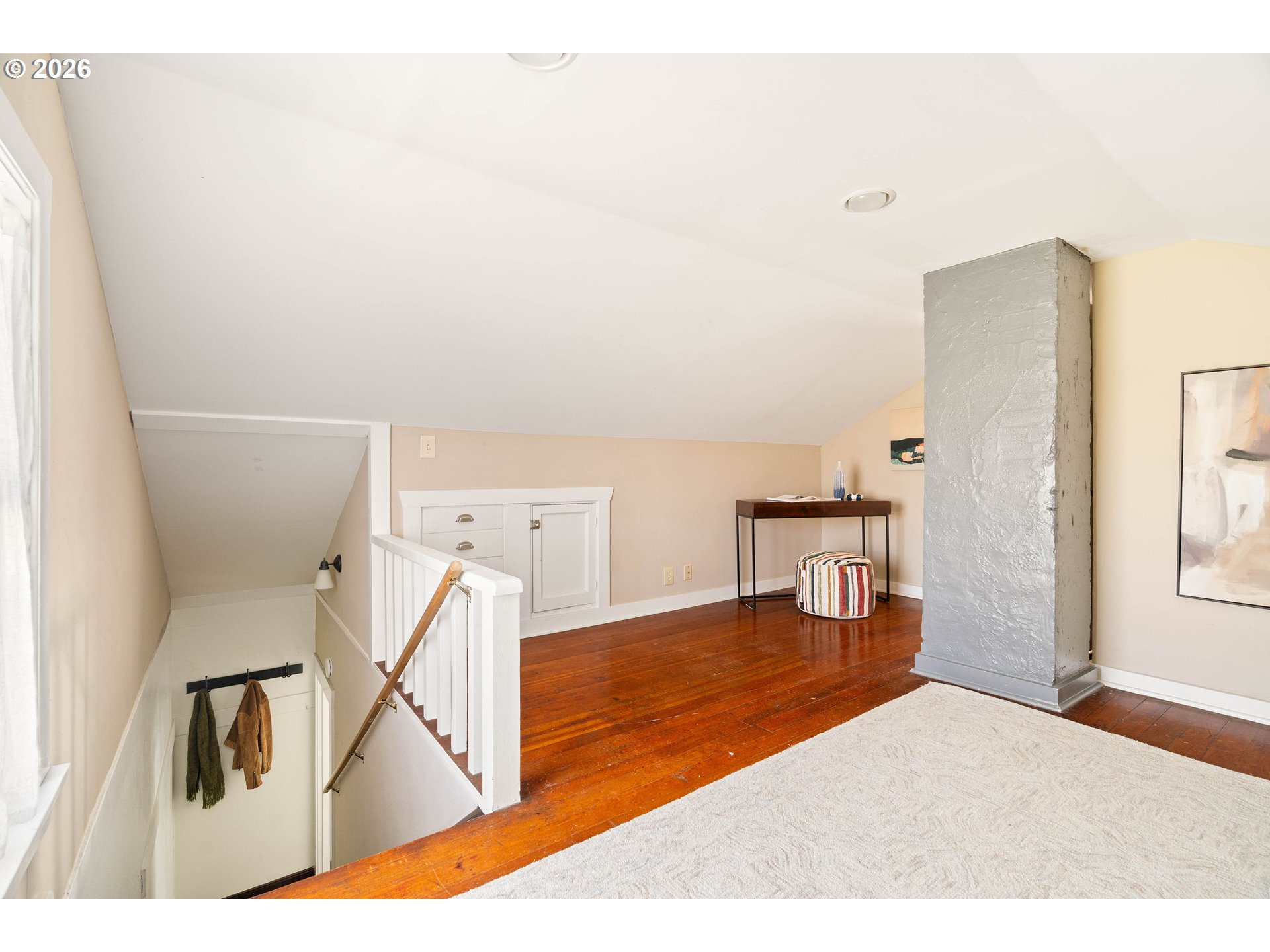 3215 Northeast 63rd Avenue Portland, OR 97213 - Photo 26 of 47 a living room with furniture and a wooden floor