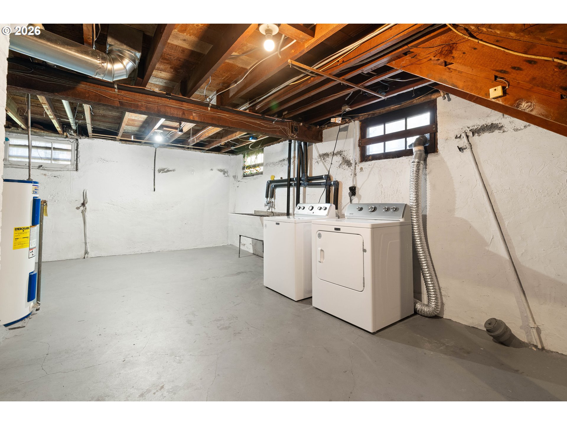 3215 Northeast 63rd Avenue Portland, OR 97213 - Photo 34 of 47 a utility room with dryer and washer