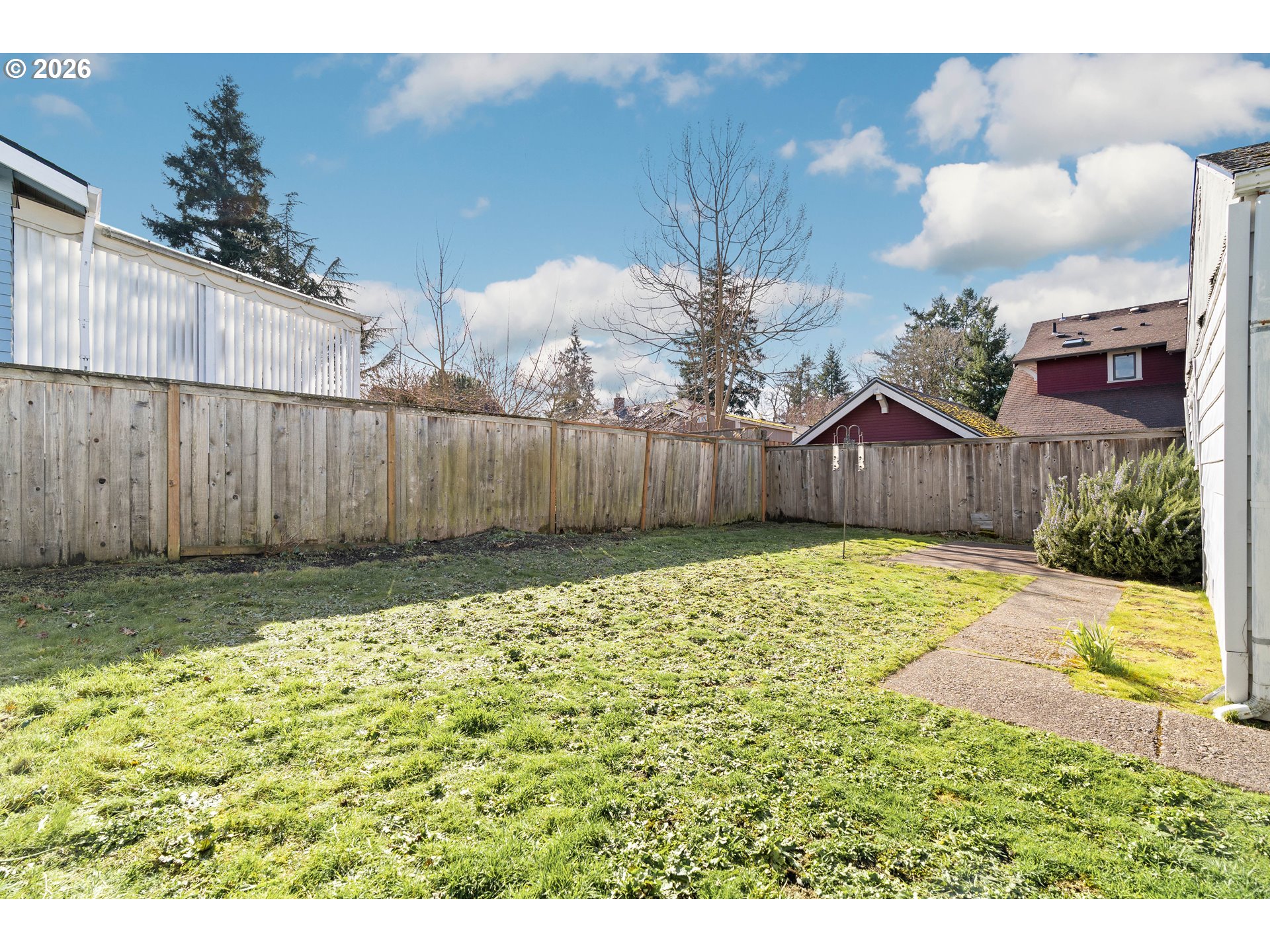 3215 Northeast 63rd Avenue Portland, OR 97213 - Photo 40 of 47 a view of a backyard with a garden