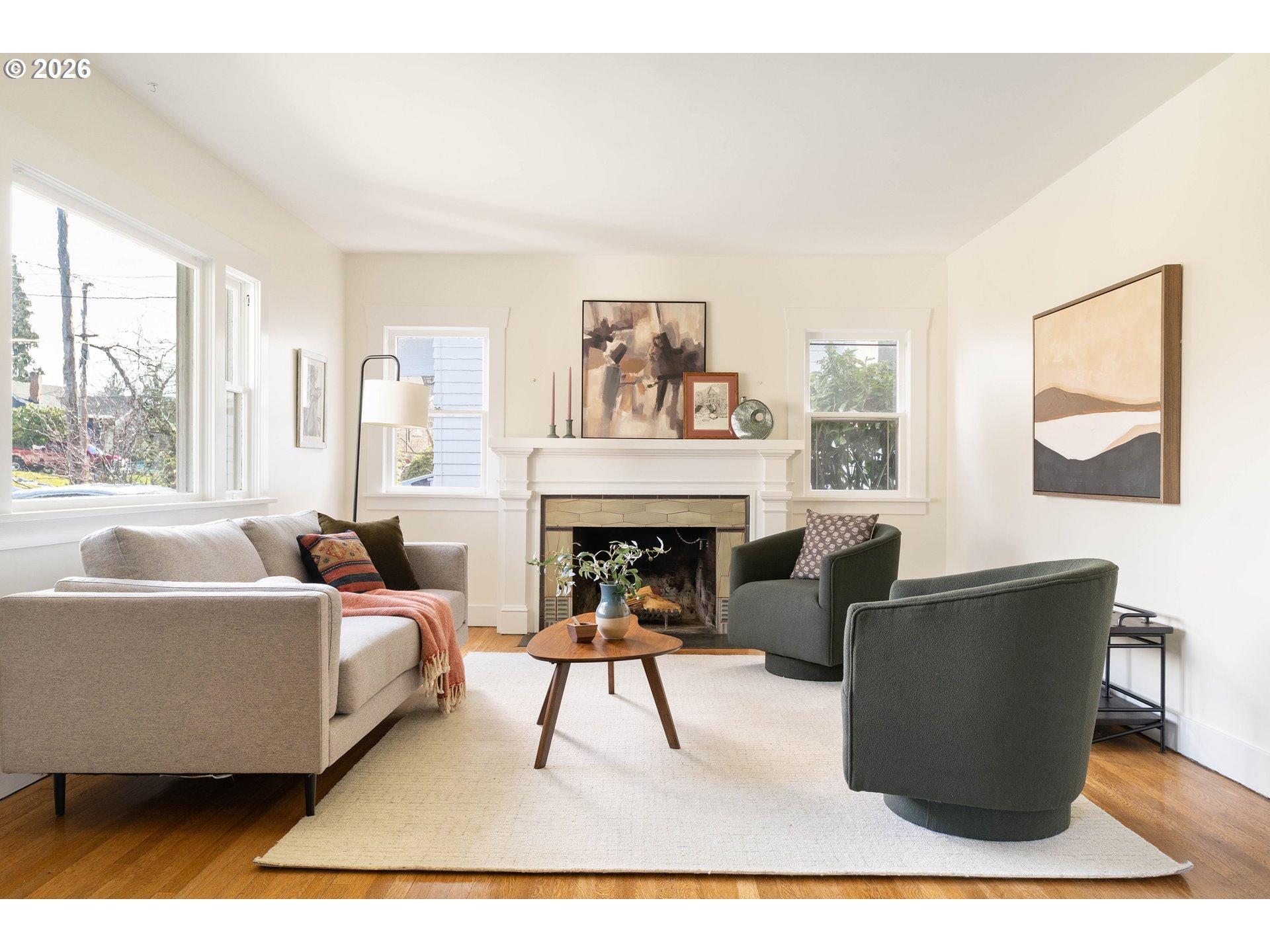 3215 Northeast 63rd Avenue Portland, OR 97213 - Photo 5 of 47 a living room with furniture and a fireplace