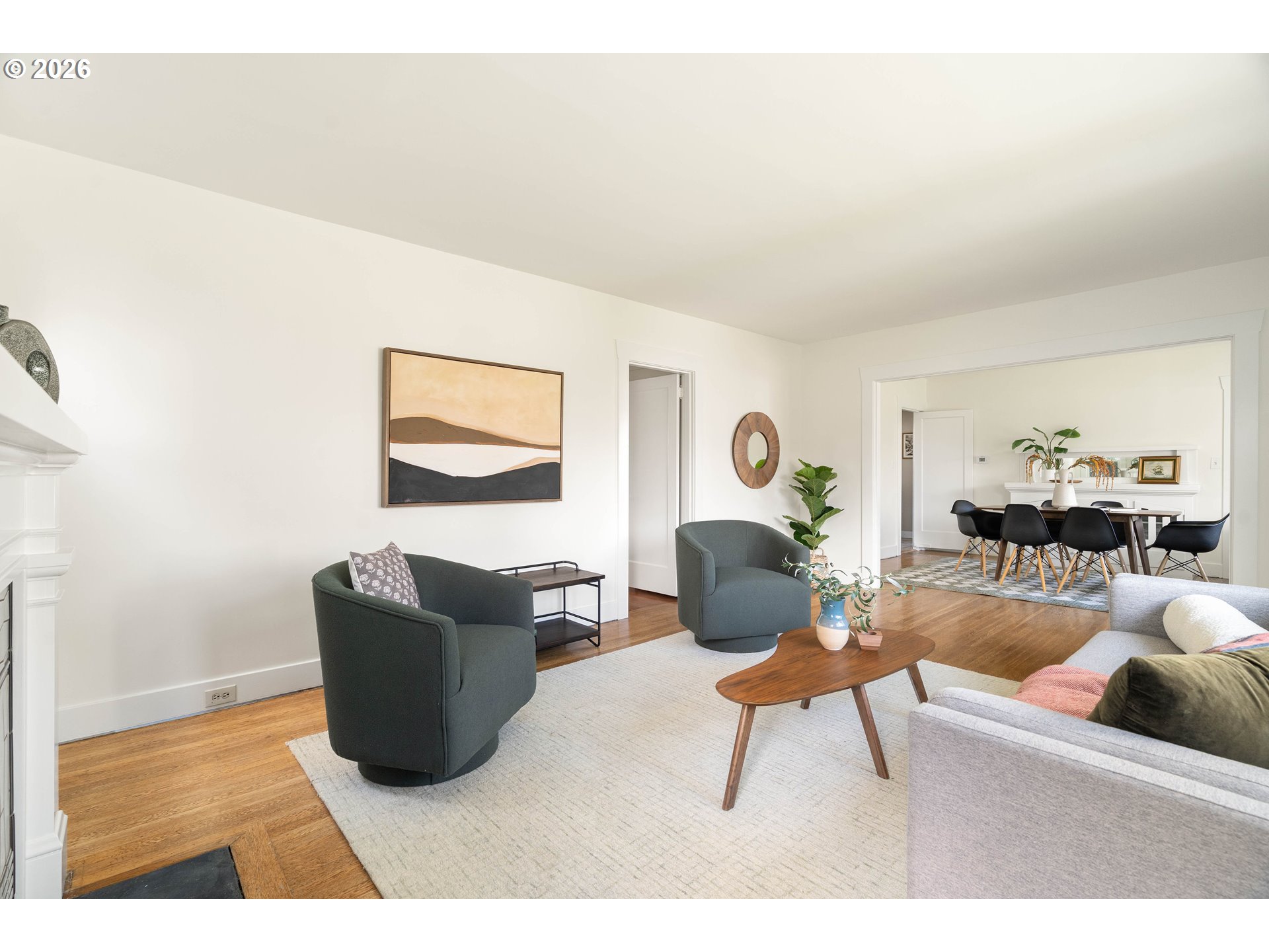 3215 Northeast 63rd Avenue Portland, OR 97213 - Photo 7 of 47 a living room with furniture a rug and a window