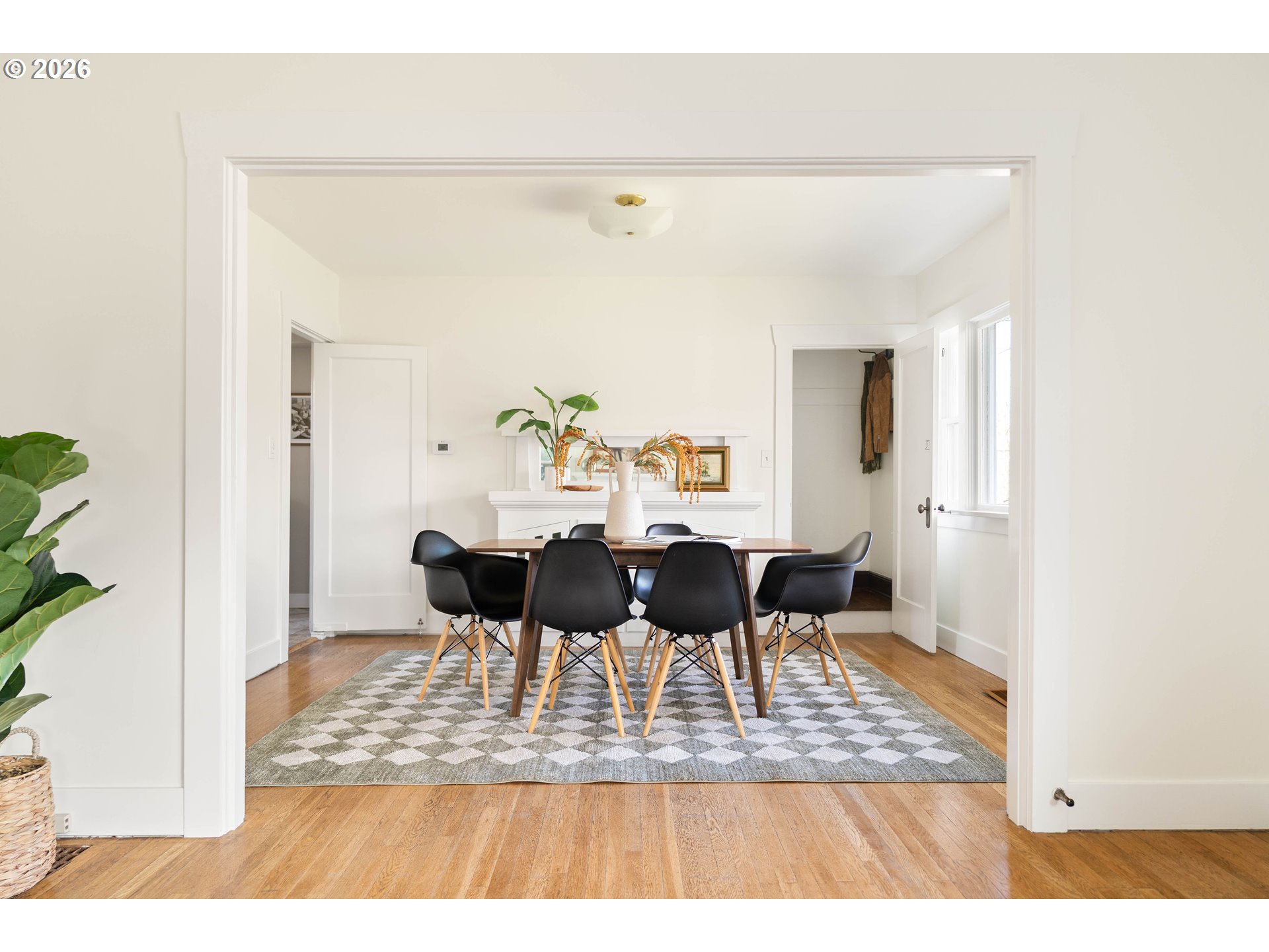 3215 Northeast 63rd Avenue Portland, OR 97213 - Photo 8 of 47 a view of a dining room with furniture and wooden floor