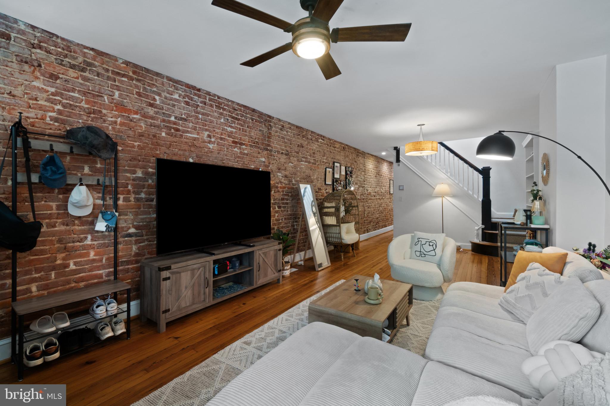 3171 Keswick Road Baltimore, MD 21211 - Photo 6 of 34 Brick accent wall
