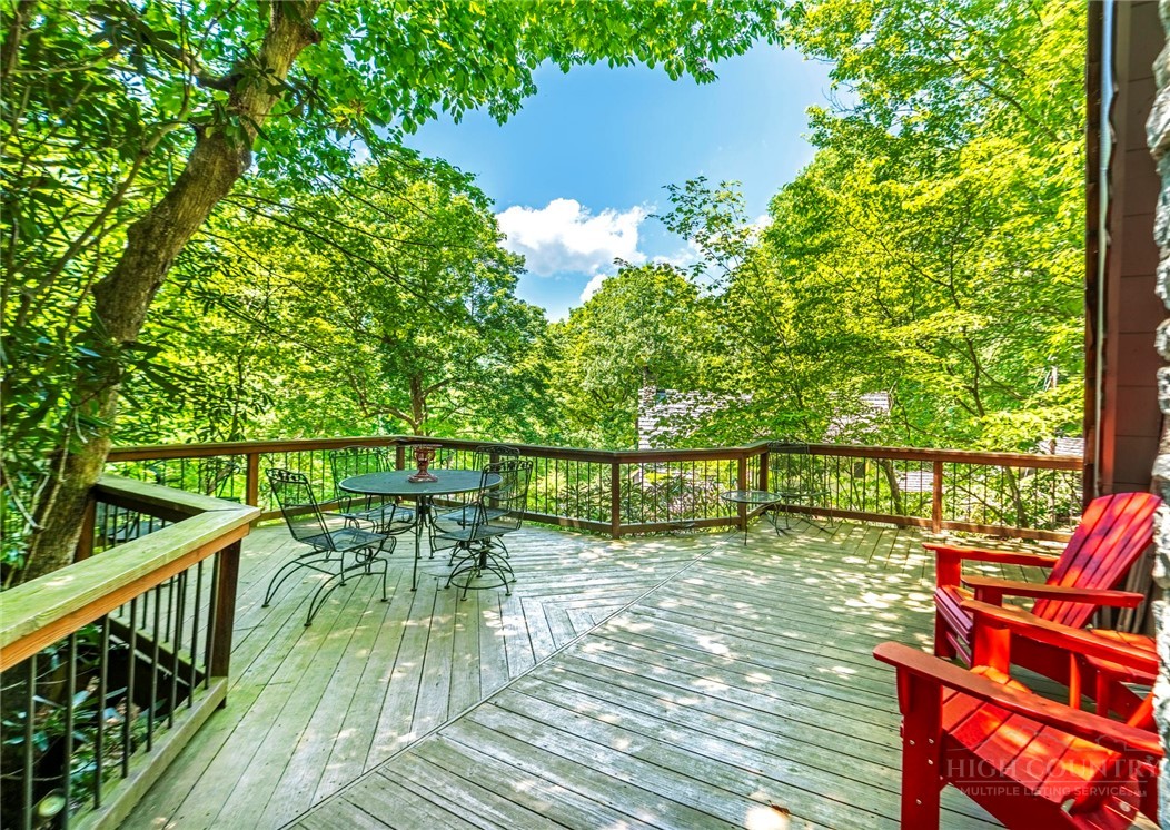 268 Cherry Drive Boone, NC 28607 - Photo 22 of 29 a view of a balcony with chairs