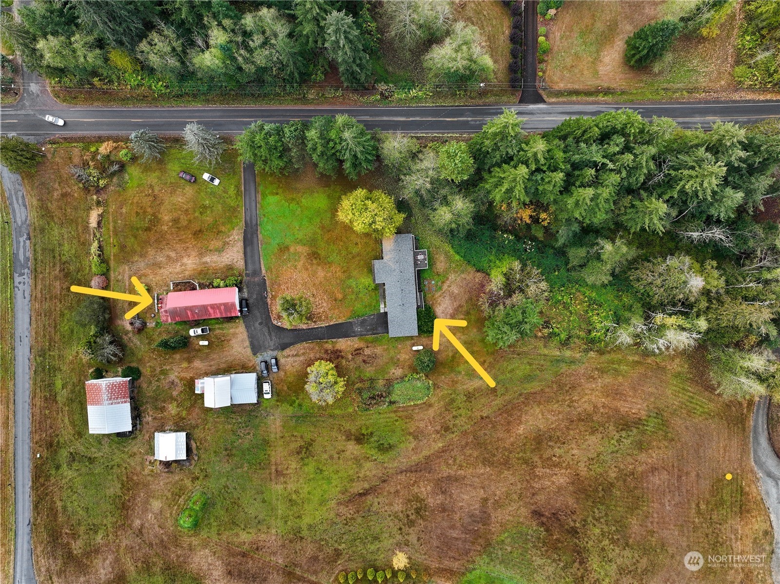 1182 East Axton Road Bellingham, WA 98226 - Photo 2 of 33 an aerial view of a house with a yard basket ball court and outdoor seating