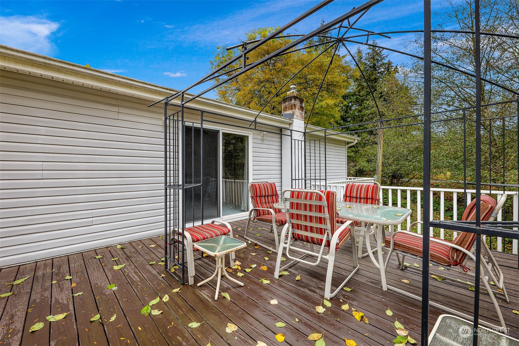 1182 East Axton Road Bellingham, WA 98226 - Photo 30 of 33 a view of a patio with a table and chairs
