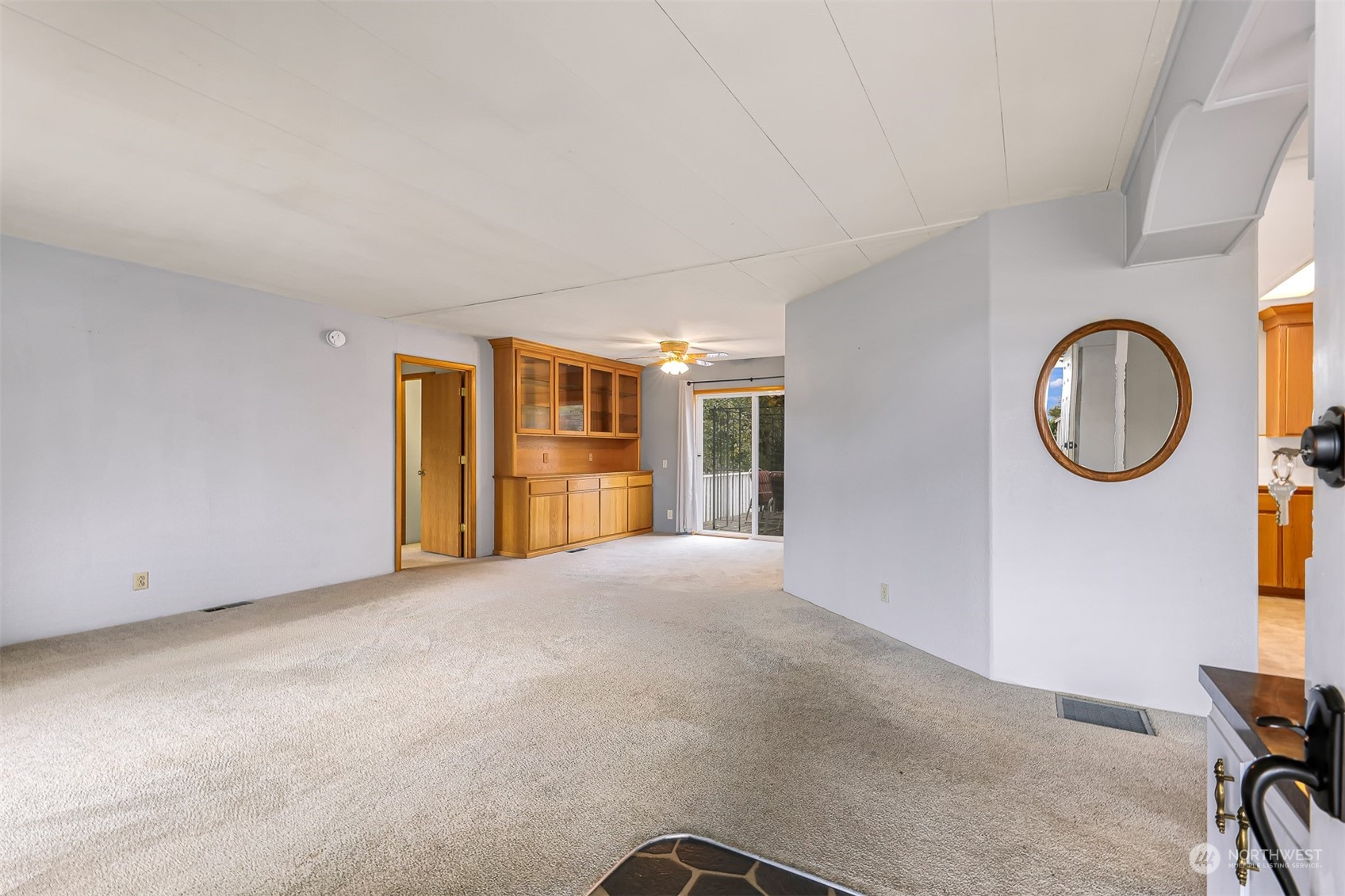 1182 East Axton Road Bellingham, WA 98226 - Photo 4 of 33 a view of a livingroom with wooden floor and a large window