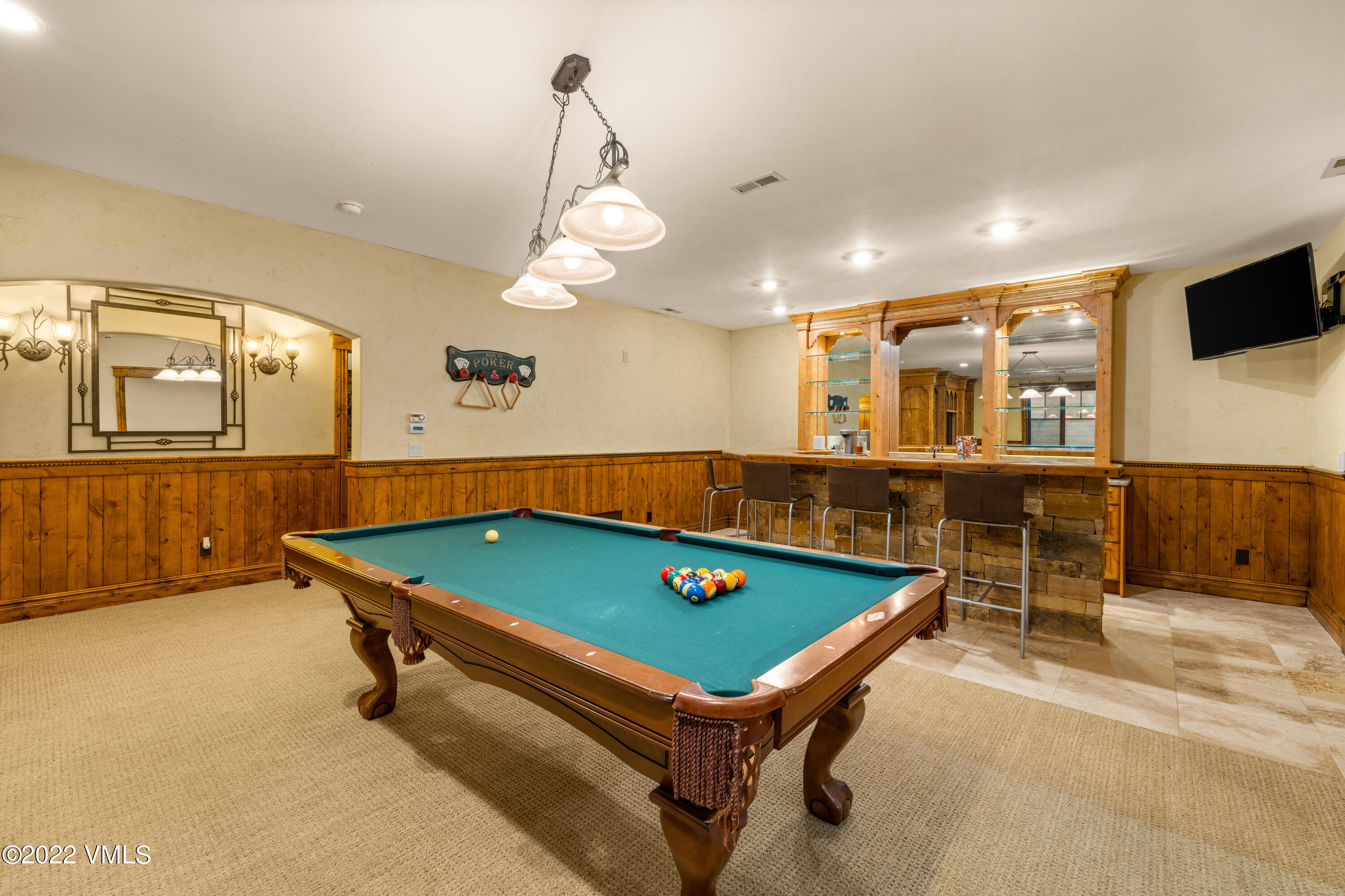 2376 Eagle Ranch Road Eagle, CO 81631 - Photo 17 of 52 a room with furniture pool table flat screen tv and windows