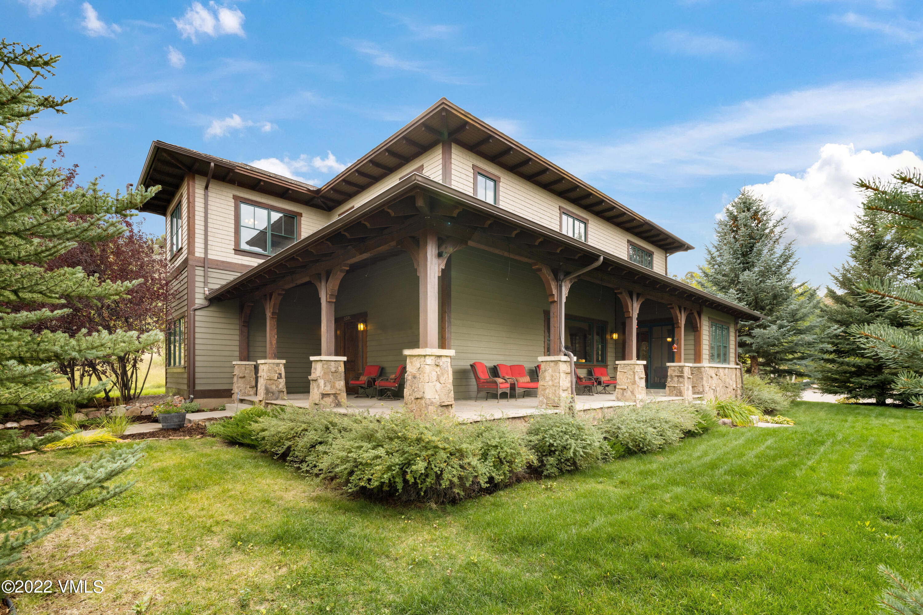 2376 Eagle Ranch Road Eagle, CO 81631 - Photo 2 of 52 a front view of house with yard and green space