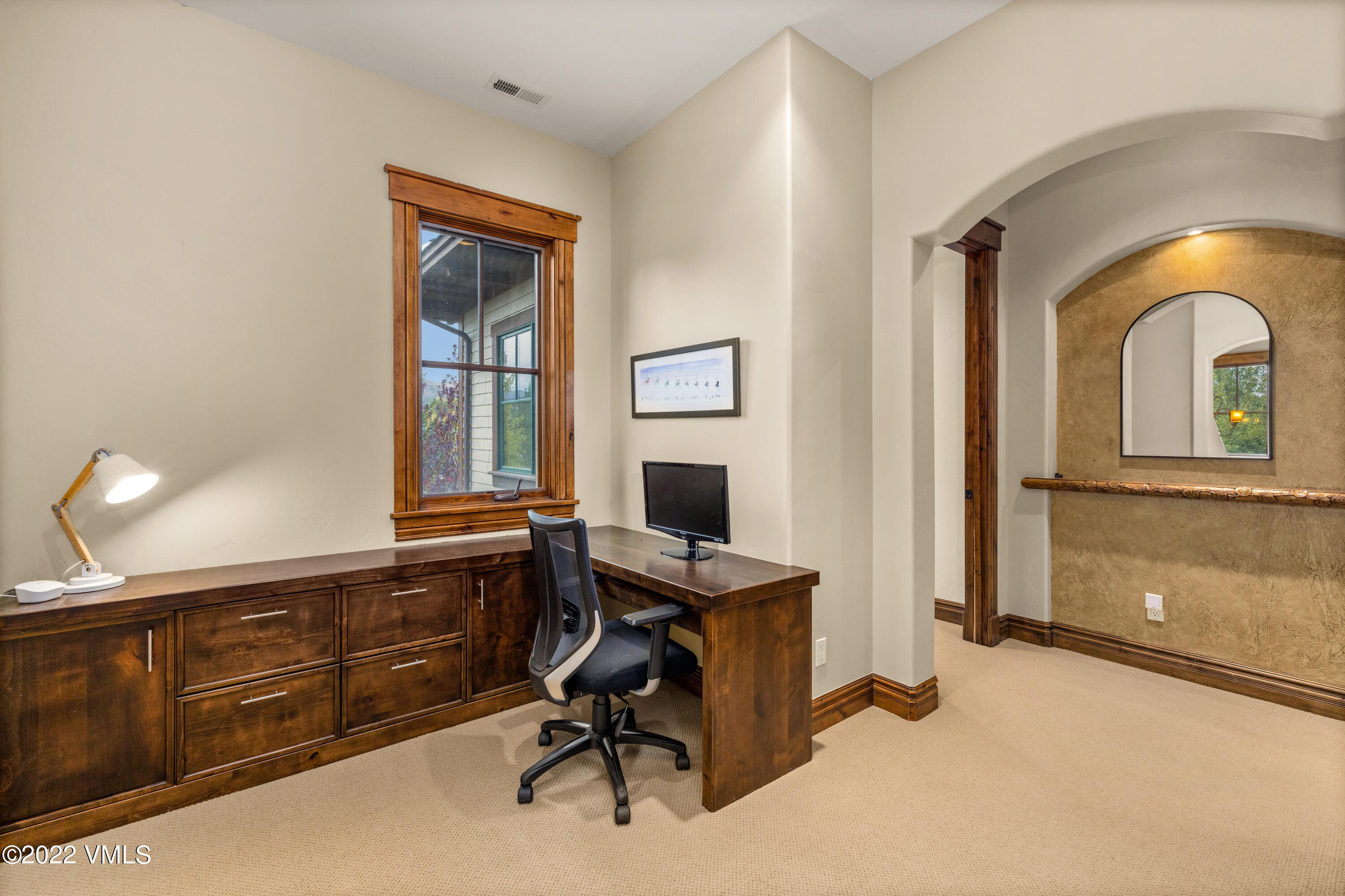 2376 Eagle Ranch Road Eagle, CO 81631 - Photo 25 of 52 a view of a workspace with furniture and a window
