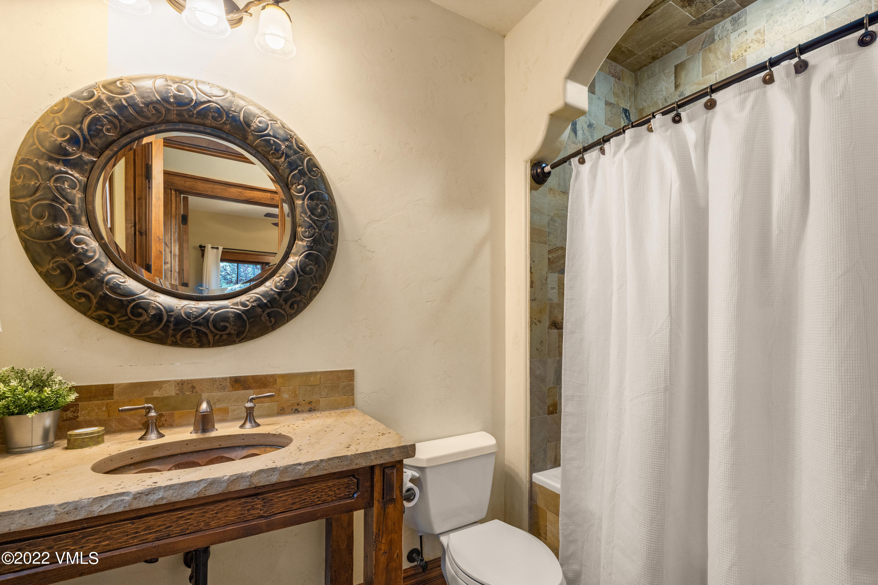 2376 Eagle Ranch Road Eagle, CO 81631 - Photo 27 of 52 a bathroom with a granite countertop sink and a mirror