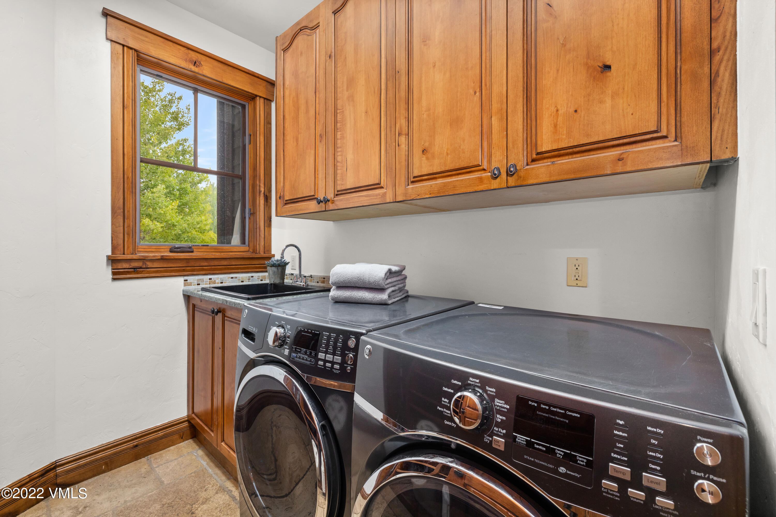 2376 Eagle Ranch Road Eagle, CO 81631 - Photo 29 of 52 a utility room with dryer and washer