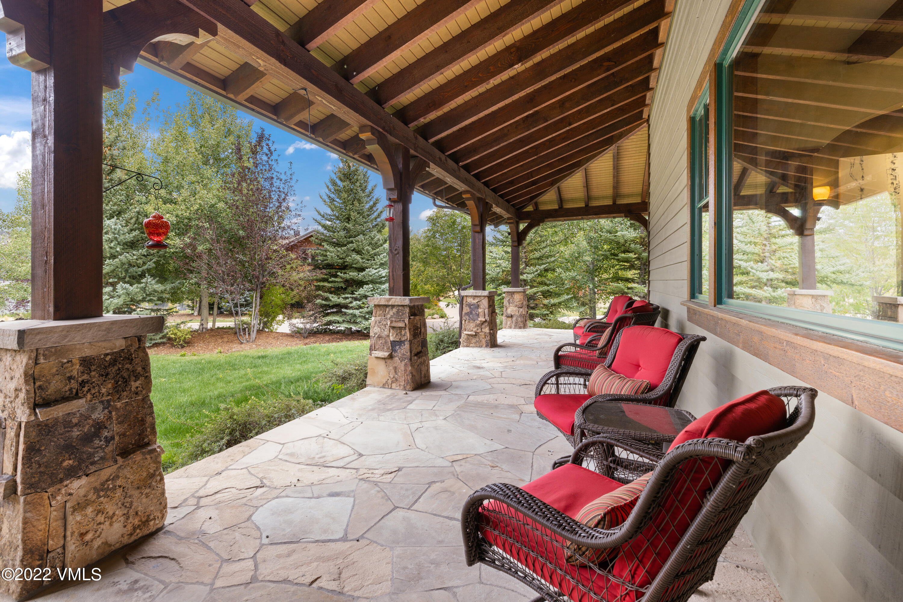 2376 Eagle Ranch Road Eagle, CO 81631 - Photo 3 of 52 a outdoor living space with furniture and garden view