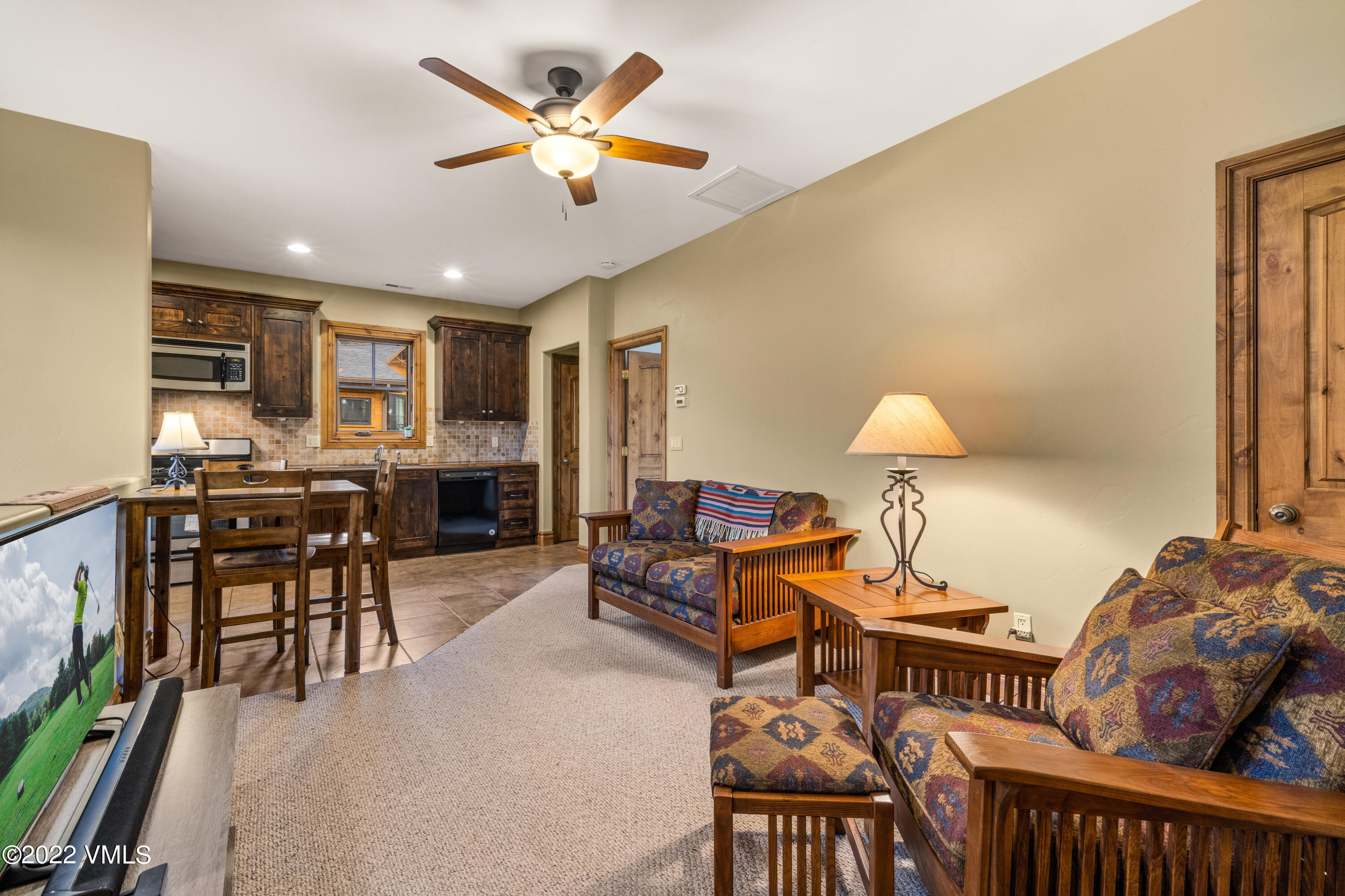 2376 Eagle Ranch Road Eagle, CO 81631 - Photo 41 of 52 a living room with furniture and a wooden floor