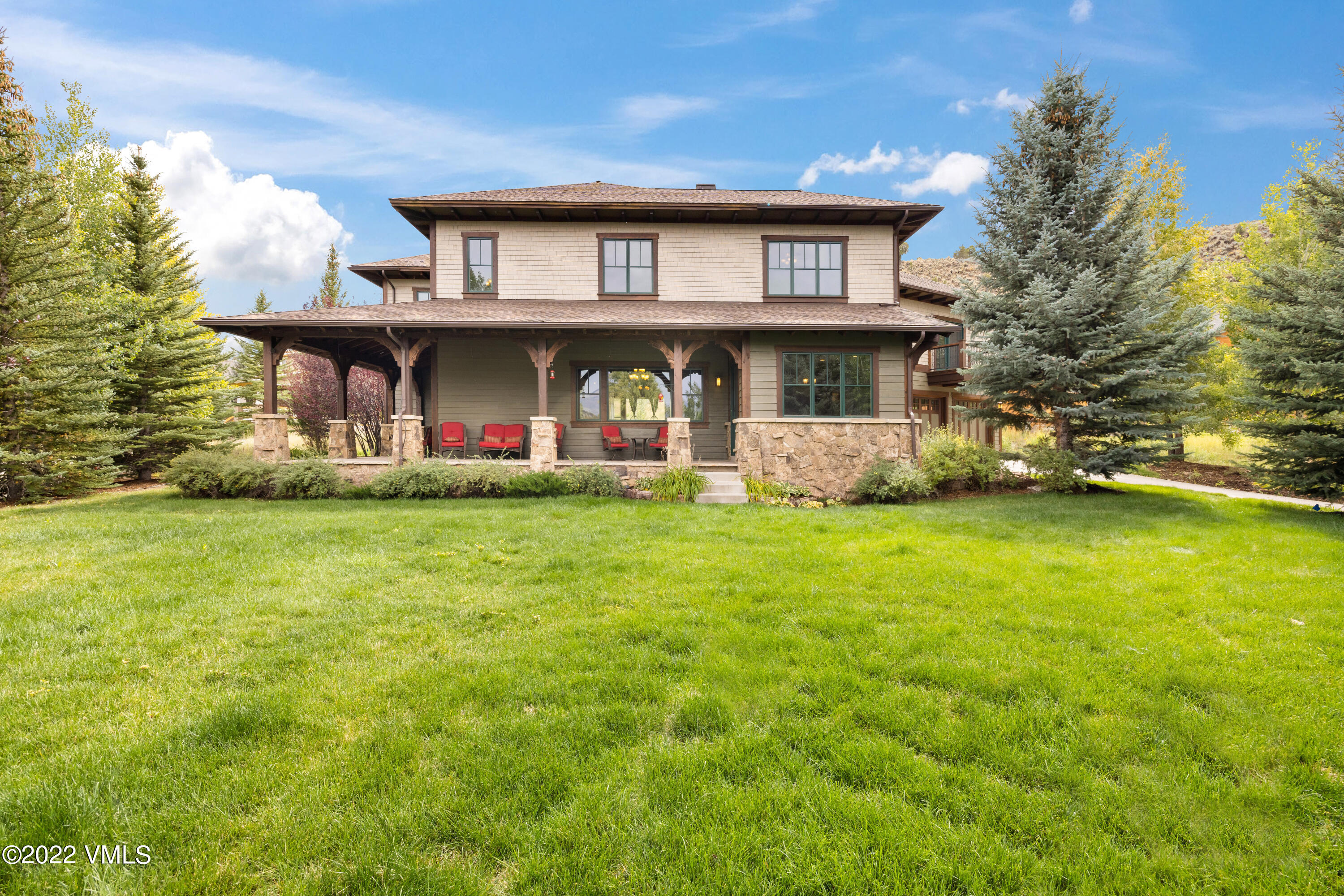 2376 Eagle Ranch Road Eagle, CO 81631 - Photo 43 of 52 a view of a house with pool and a yard