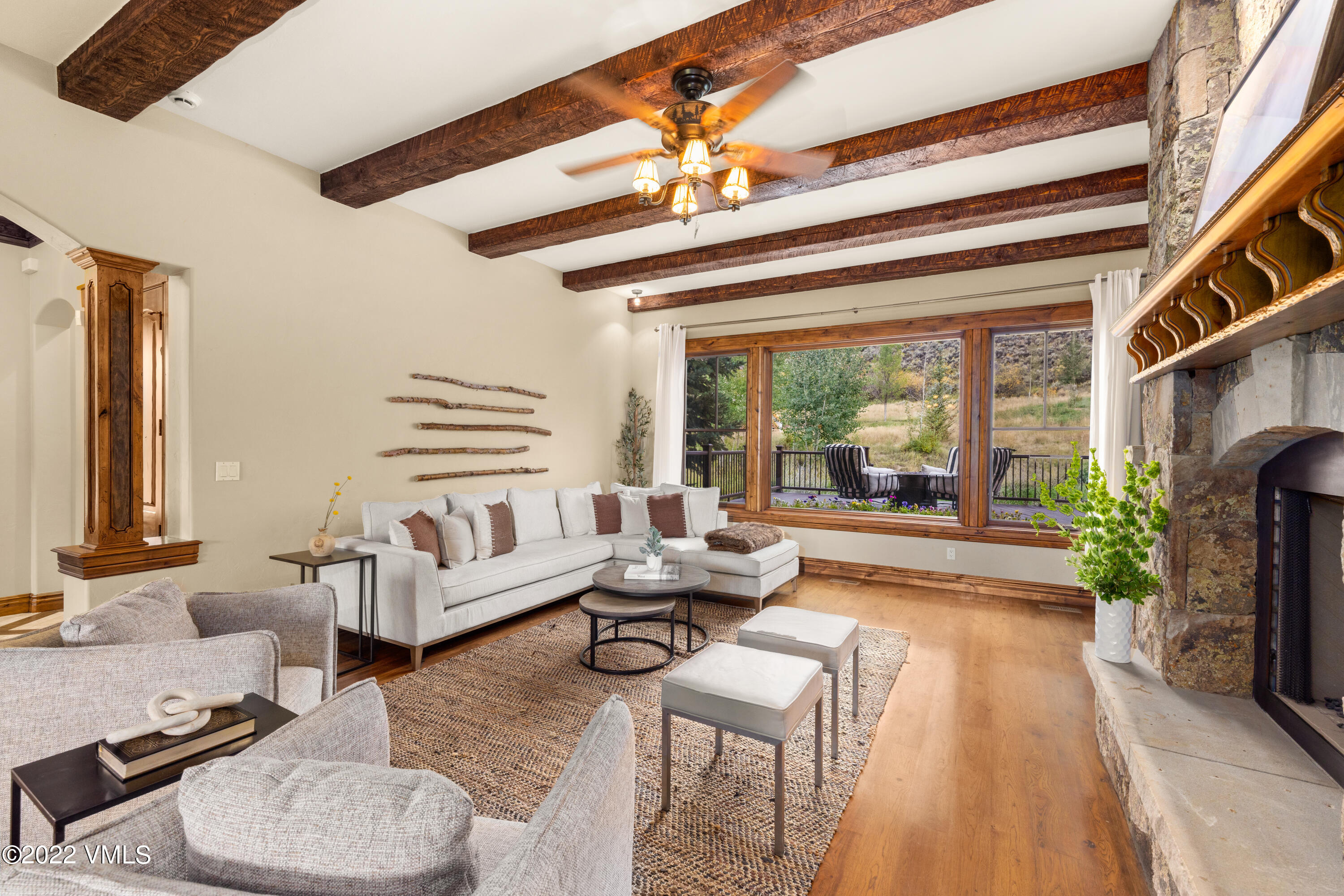 2376 Eagle Ranch Road Eagle, CO 81631 - Photo 6 of 52 a living room with furniture and a large window