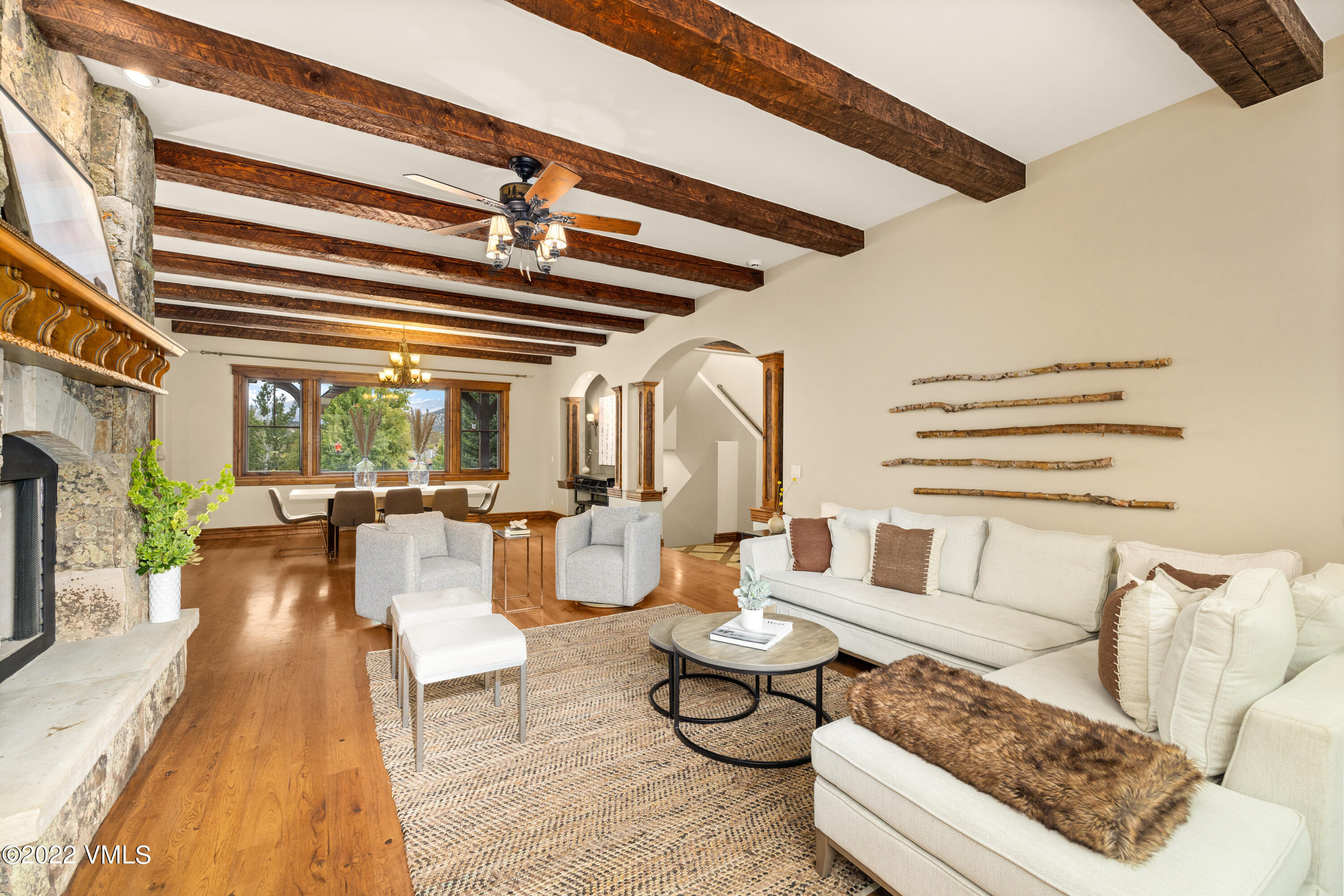 2376 Eagle Ranch Road Eagle, CO 81631 - Photo 7 of 52 a living room with furniture and a floor to ceiling window