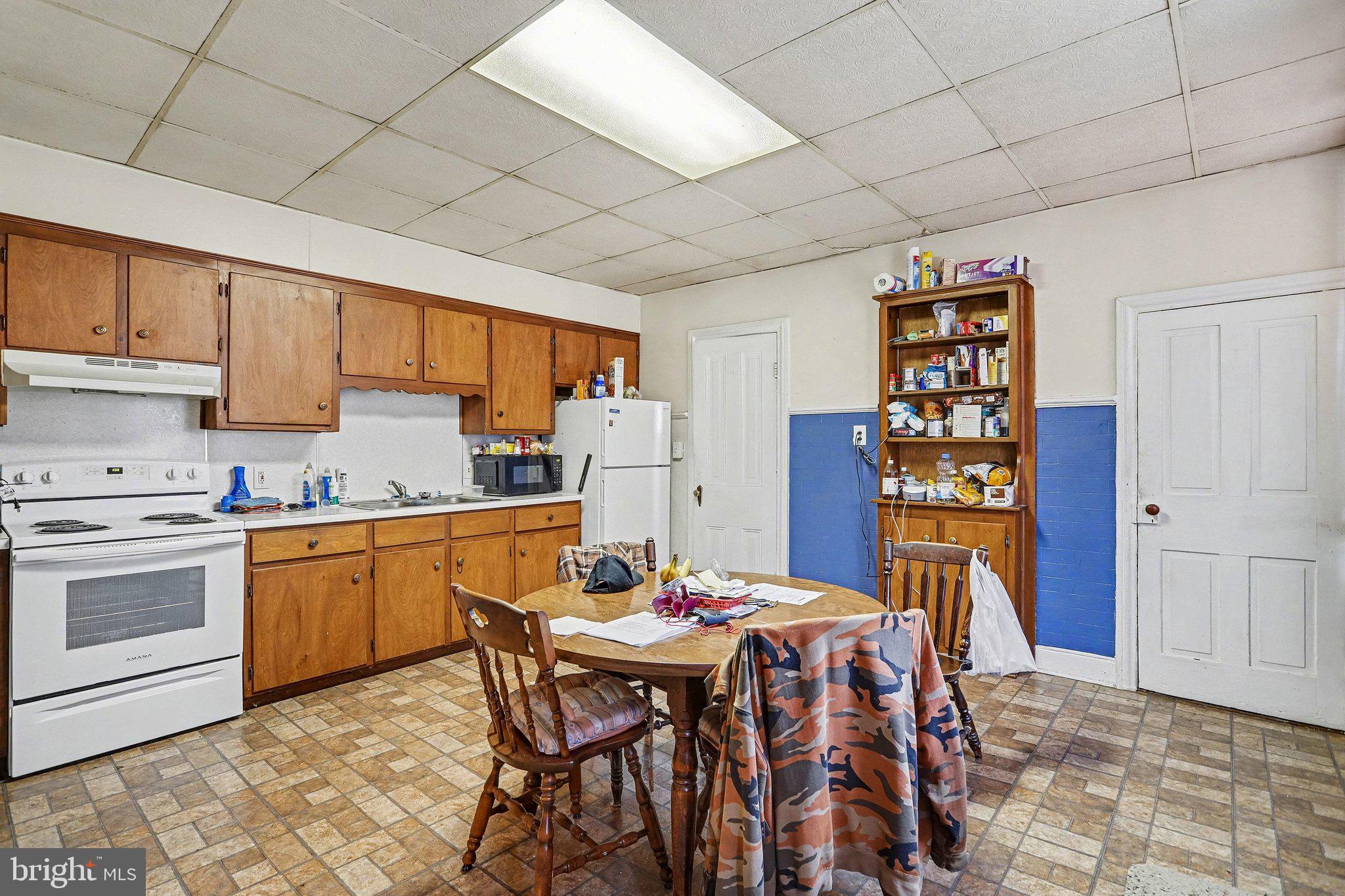 601 Maple Street Lebanon, PA 17046 - Photo 16 of 47 Cozy kitchen with warm wooden tones.
