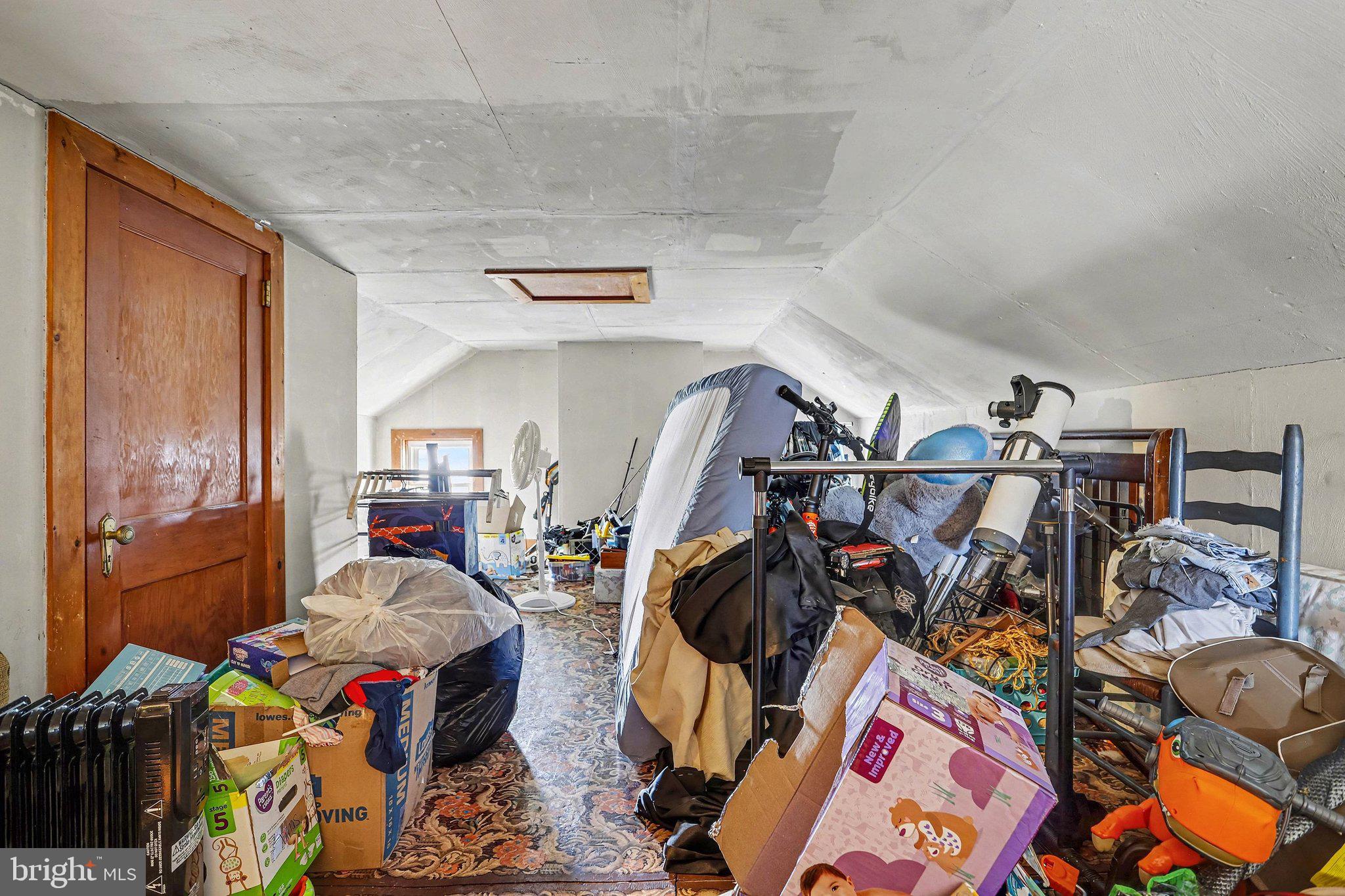 601 Maple Street Lebanon, PA 17046 - Photo 27 of 47 Cluttered attic brimming with potential.
